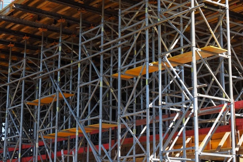 Scaffolding access system erected around a structure