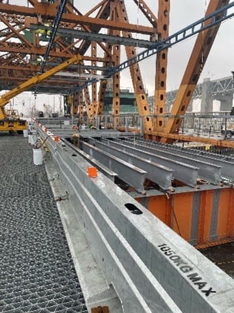 Steelwork below a bridge deck under construction