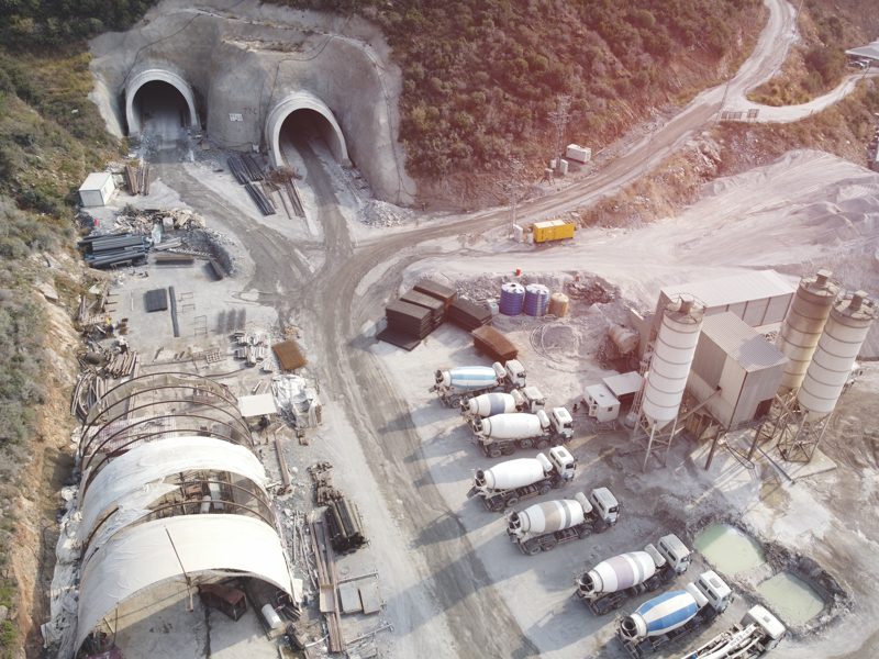 Aerial view of twin tunnel portals under construction