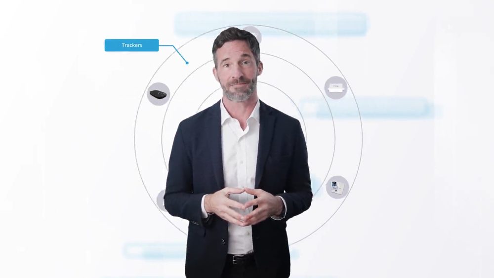Presenter explaining the Operational Digital Twin with tracker graphics