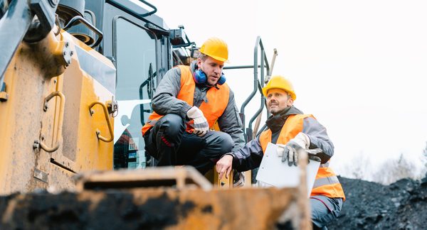 Site managers reviewing operational performance together